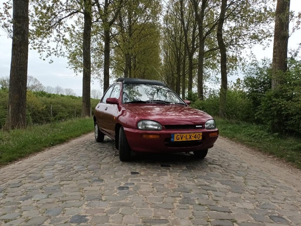 Mazda 121 YOOH Cabriotop !, Stof, Elektrische ramen, Handgeschakeld, Particulier