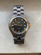 Tissot horloge heren titanium/goud vintage, Handtassen en Accessoires, Overige materialen, Polshorloge, Overige materialen, Zo goed als nieuw