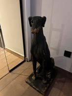 Beeld van een hond, Ophalen