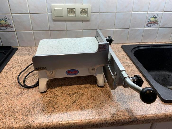 Professionele kaassnijder verwarmd UNIKA, Huis en Inrichting, Keuken | Keukenbenodigdheden, Ophalen