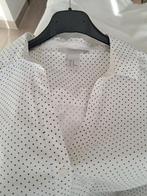 Witte bloes met zwarte stippen, Ophalen