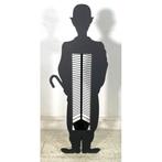 design cd houder in de vorm van charlie chaplin, Huis en Inrichting, Ophalen, Zo goed als nieuw, Metaal, 25 tot 75 discs