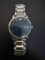 Emporia armani horloge, Ophalen