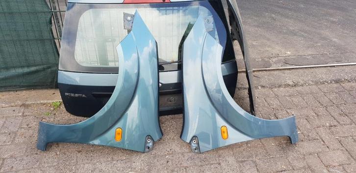 FORD FIESTA VOORSCHERMEN BJ 2002 TOT 2008, Auto-onderdelen, Carrosserie, Spatbord, Gebruikt, Ophalen of Verzenden