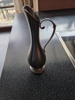 Tinnen vaasje, Ophalen