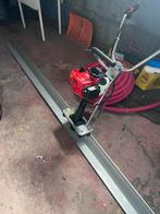 Vends regle vibrante a beton, Ophalen
