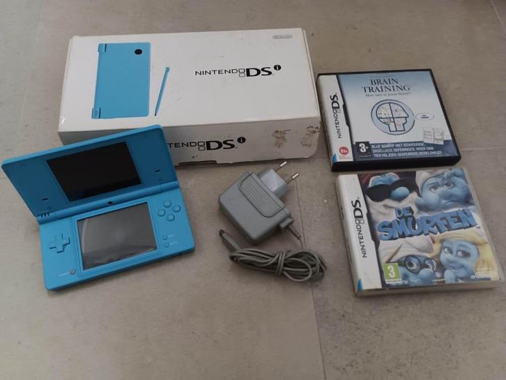 Nintendo DSi in de originele doos, Games en Spelcomputers, Spelcomputers | Nintendo DS, Gebruikt, Dsi, Blauw, Met games, Ophalen of Verzenden