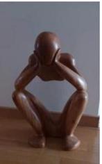 Statue africaine Le Penseur, Enlèvement ou Envoi