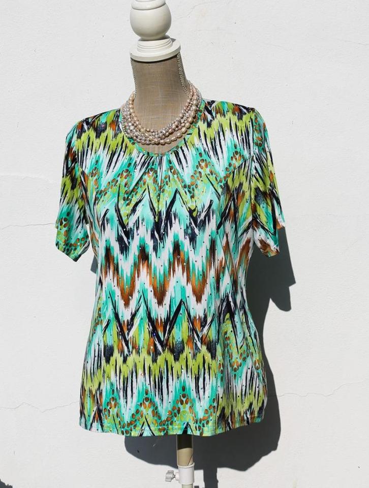 Zeer mooie glanzende blouse T38-40, Kleding | Dames, Blouses en Tunieken, Zo goed als nieuw, Maat 38/40 (M), Ophalen of Verzenden