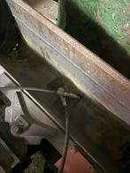 Bac de curage hydraulique inclinable, Enlèvement