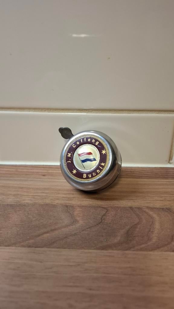 Sonnette de vélo par J.M Coffeng de Bunnik, Enlèvement