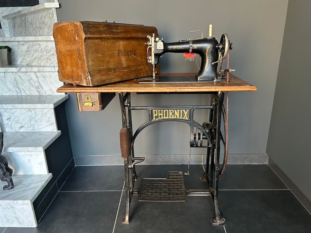 Phoenix naaimachine, Ophalen