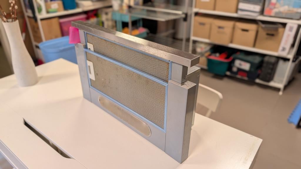 Dampkap (inbouw), Ophalen, Inbouw