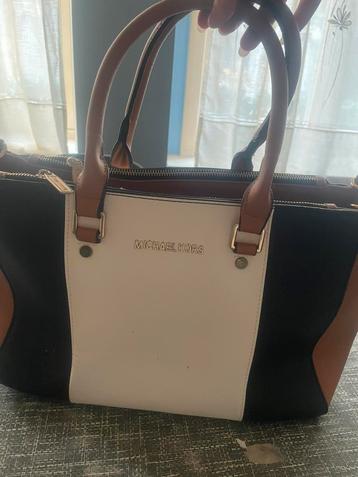 Michael Kors, Ophalen, Gebruikt
