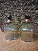 Glazen pot met decoratieve ijzeren deksel., Huis en Inrichting, Ophalen