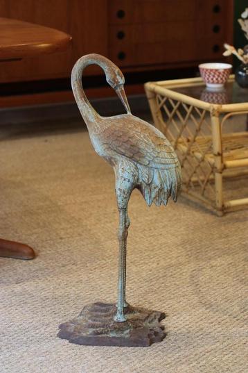 Oude reiger gemaakt van gietijzer beschikbaar voor biedingen