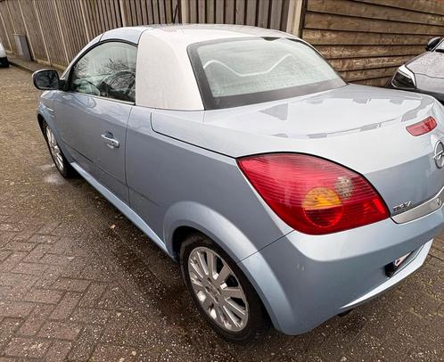 Opel tigra cabrio, Auto's, Opel, Particulier, Tigra, Radio, Diesel, Cabriolet, 2 deurs, Handgeschakeld, Blauw, Zwart, Leder en Stof