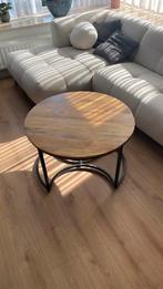 Ronde salon tafel, Ophalen