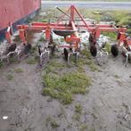 Ruggenschaafmachine, Enlèvement