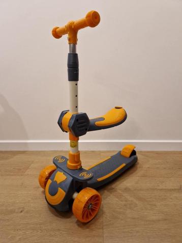 Kinder step met zitje beschikbaar voor biedingen