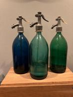 3 mooie sodaflessen, Enlèvement