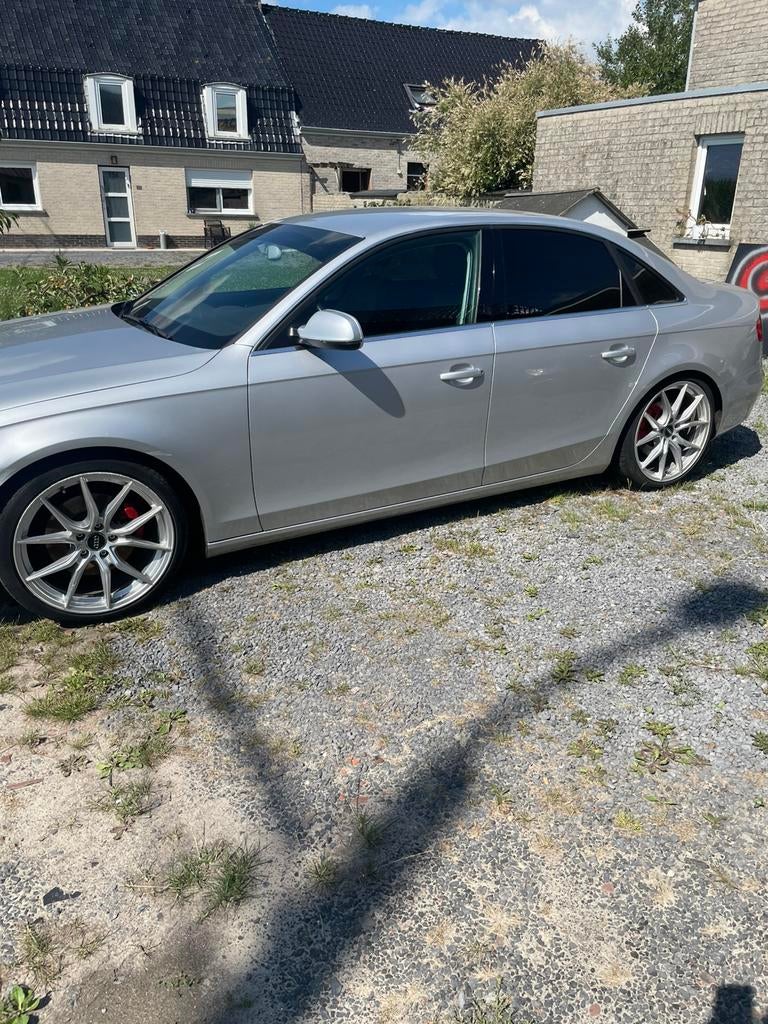 Audi a4 attraction 2010, Auto's, Audi, Voorwielaandrijving, 4 deurs, Stof, Zwart