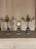 Antiek schouwgarnituur, Ophalen