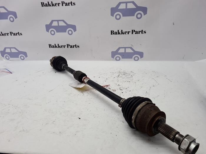 Aandrijfas rechts-voor van een Opel Corsa, Auto-onderdelen, Remmen en Aandrijving, Opel, Gebruikt, 3 maanden garantie