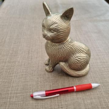 Wit metalen (tin?) kat beschikbaar voor biedingen