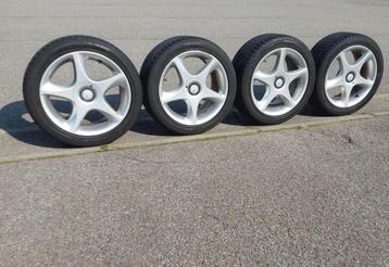 4 très belles jantes pour Opel avec pneus été 235/45-17  beschikbaar voor biedingen