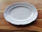 Porseleinen ovalen bord met zilveren rand Nieuw, Huis en Inrichting, Ophalen of Verzenden