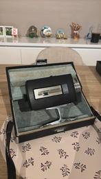 Bell & Howell Autoload 8mm, Ophalen