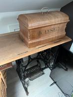 Antieke naaimachine Kayser, Ophalen