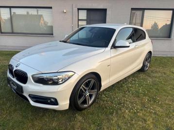 BMW 118i Sport-Line Navi/AutAirco/Cruise/Bluetooth/PDC/USB beschikbaar voor biedingen