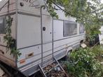 Caravan voor opmaak of onderdelen met papieren