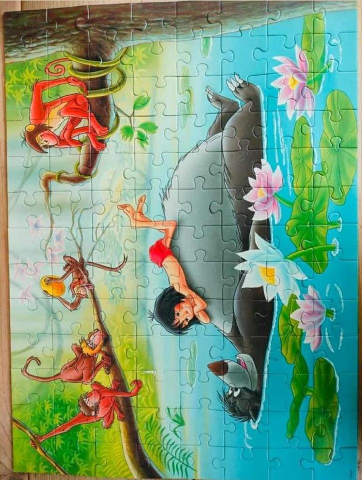 Mooie Ravensburger 100 stuks. Thé jungle book met aapjes!, Kinderen en Baby's, Speelgoed | Kinderpuzzels, Zo goed als nieuw, 6 jaar of ouder