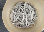 Elastiek, Ophalen, Zo goed als nieuw