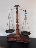 Oude weegschaal, Ophalen