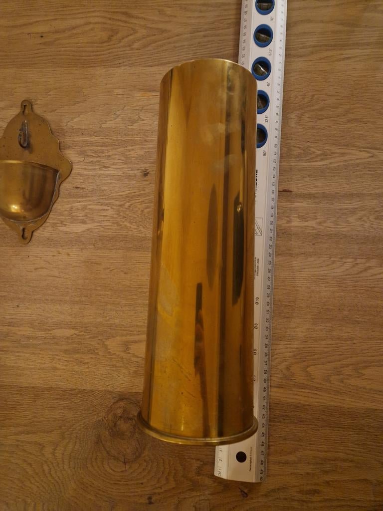 Fut obus en laiton, Enlèvement