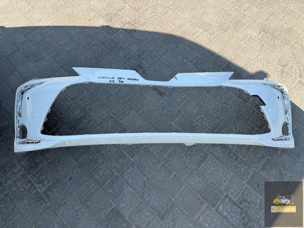 Toyota Corolla E21 Sedan 18- Voorbumper, Info@toyota.co.jp, Gebruikt, Toyota Motor Corporation, Toyota-Cho 1
471-8571  Toyota City