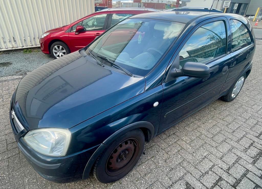 Opel Corsa 1L benzine gekeurd v.vk., 4 zetels, Stof, Zwart, Blauw