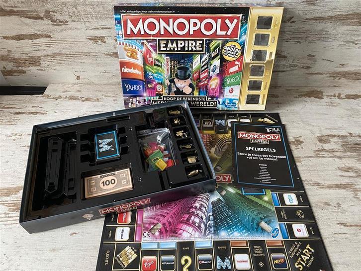 Monopoly Empire koop de bekendste merken ter wereld [s208], Hobby en Vrije tijd, Gezelschapsspellen | Bordspellen, Zo goed als nieuw