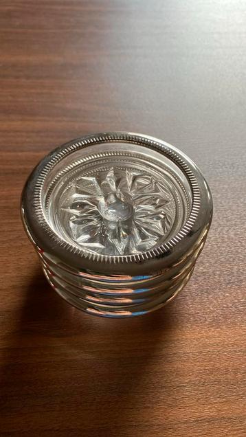 4 glazen/zilveren onderzetters beschikbaar voor biedingen