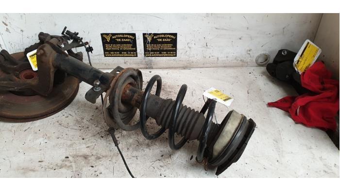 Schokdemperpoot rechts-voor van een Renault Megane Scenic, Auto-onderdelen, Ophanging en Onderstel, Renault, Gebruikt, 3 maanden garantie