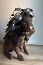 Metalen Leeuw, Ophalen