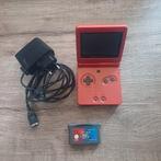 Nintendo Game Boy Advance SP Red + lader en gratis game, Ophalen of Verzenden, Zo goed als nieuw, Game Boy Advance SP, Met games