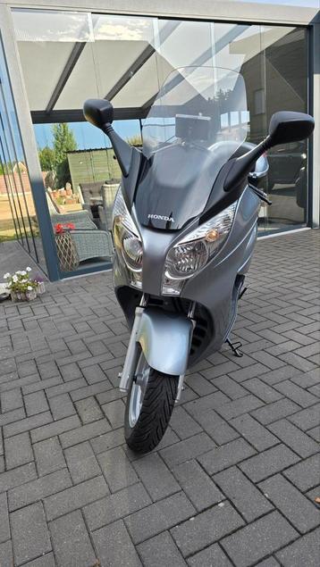 Honda Swing met GPS in zeer goede staat >Doe een Bod  beschikbaar voor biedingen
