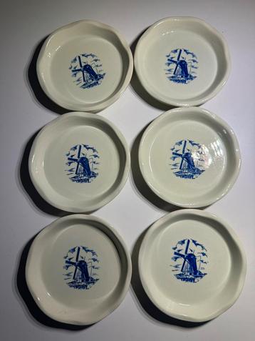 Porseleinen onderzetters Royal Delft/Bols beschikbaar voor biedingen