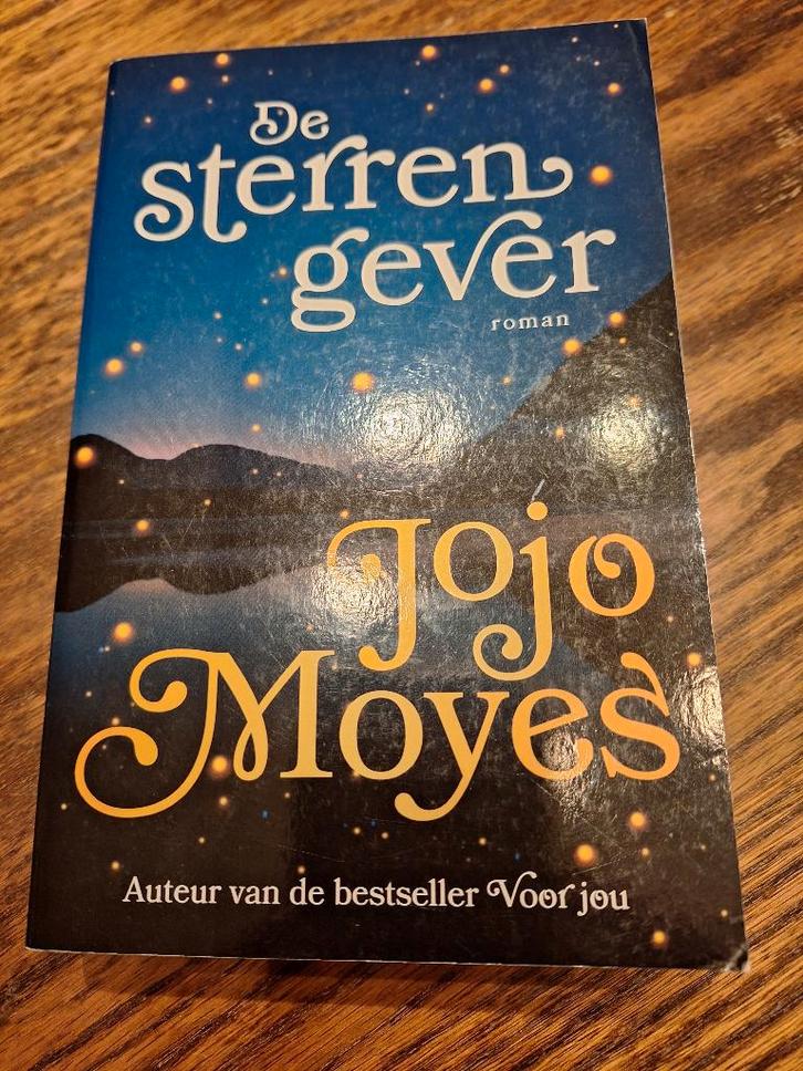 JOJO MOYES : DE STERRENGEVER, Boeken, Romans, Zo goed als nieuw, Ophalen of Verzenden