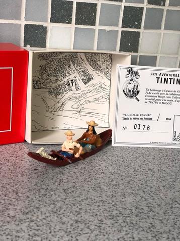 L’oreille cassée tintin et Milou dans la pirogue  disponible aux enchères